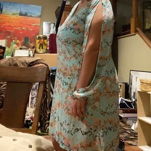 Dress. Lightweight and flirty. Arms are flowy